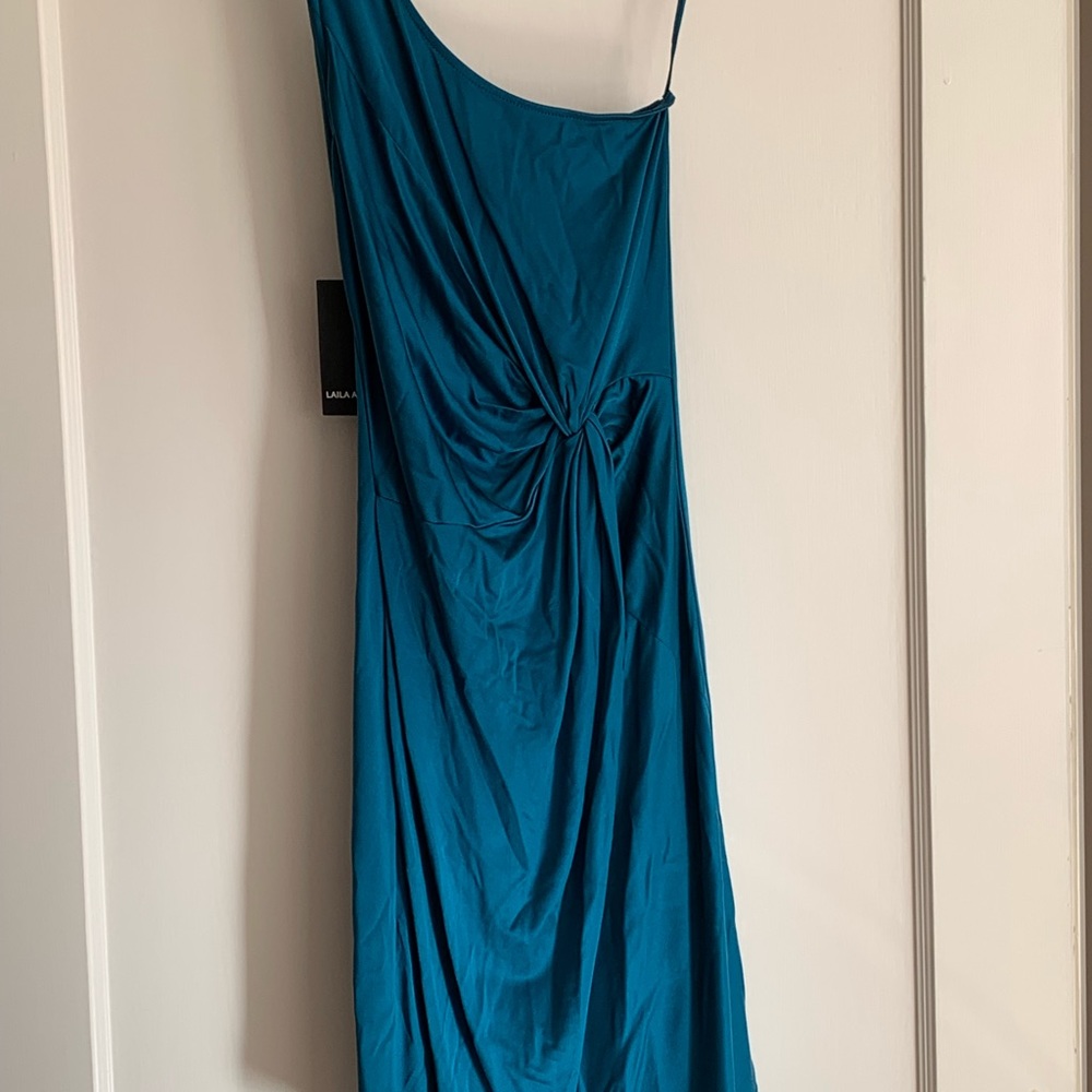 Laila Azhar. Turquoise blue one shoulder dress